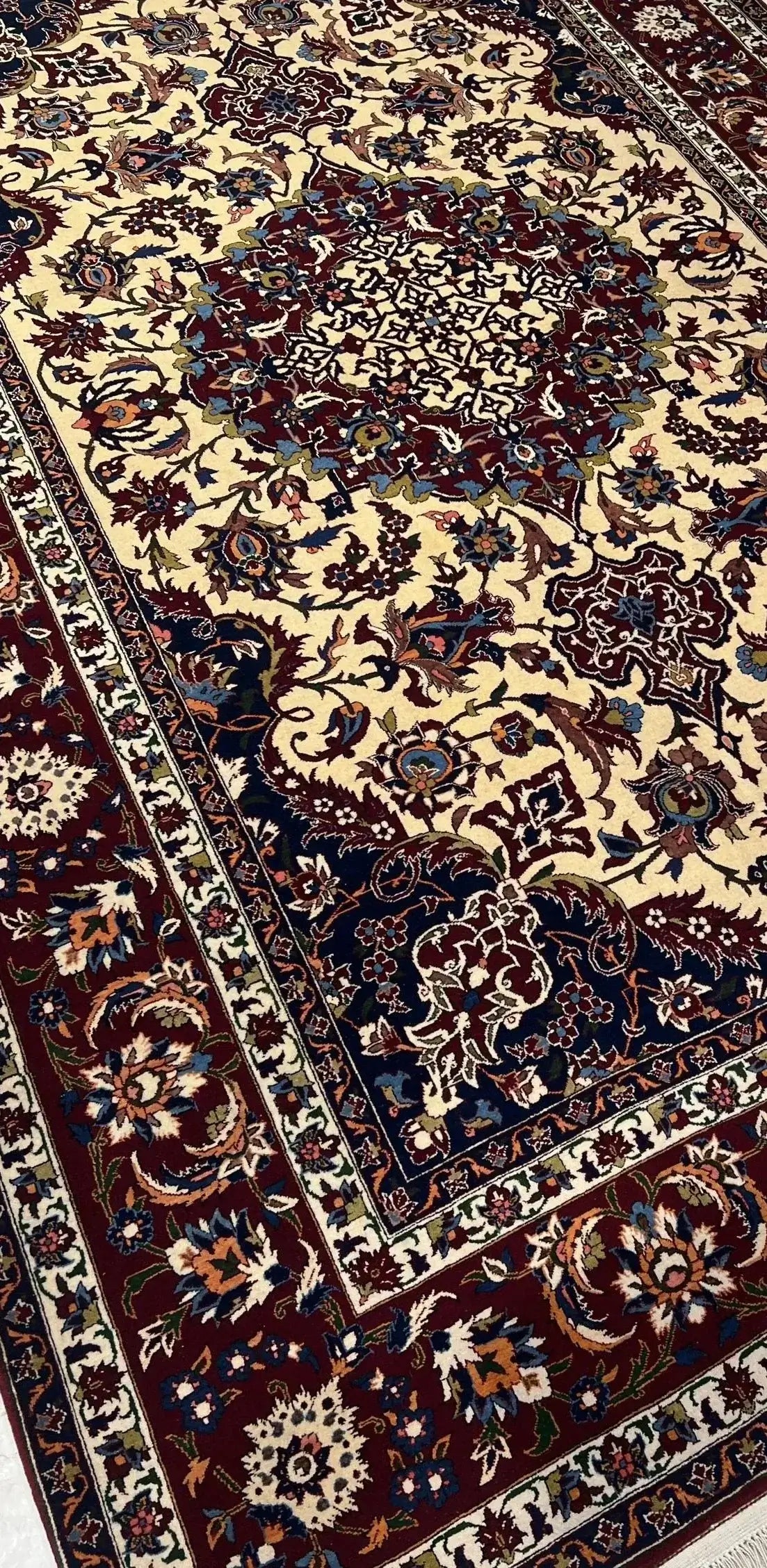 "Authentic Persian rug in 223x150 cm, made with natural dye, wool, and silk warp. Decorative oriental rug, perfect for luxury home decor. Handcrafted in Isfahan, Iran, and available in limited stock."